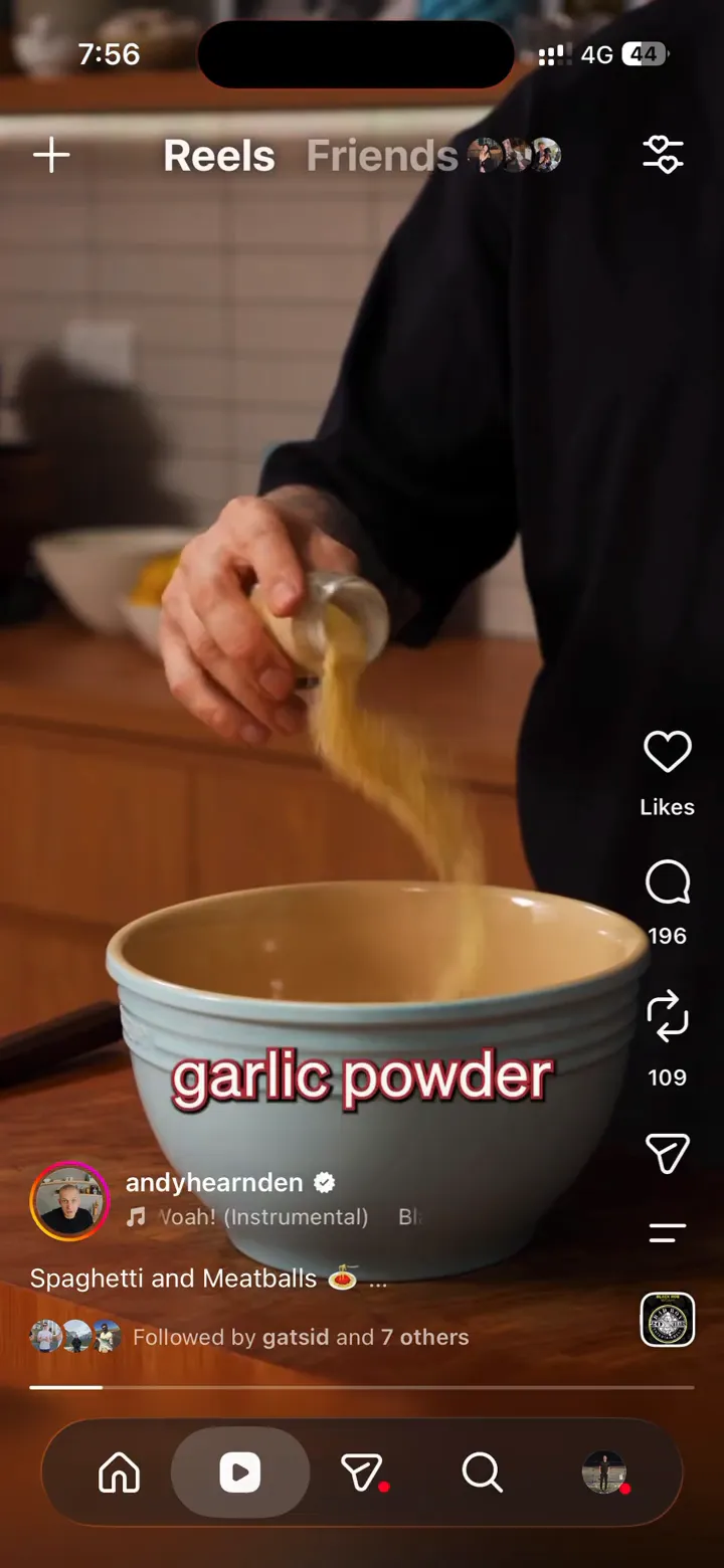 An Instagram reel by andyhearnden showing garlic powder poured into a mixing bowl for spaghetti and meatballs